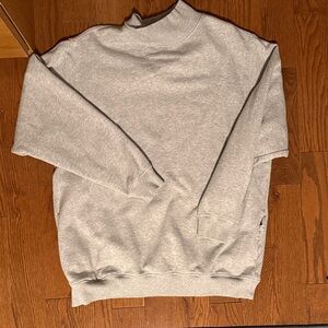 Grey mock neck oversized sweater with pockets
